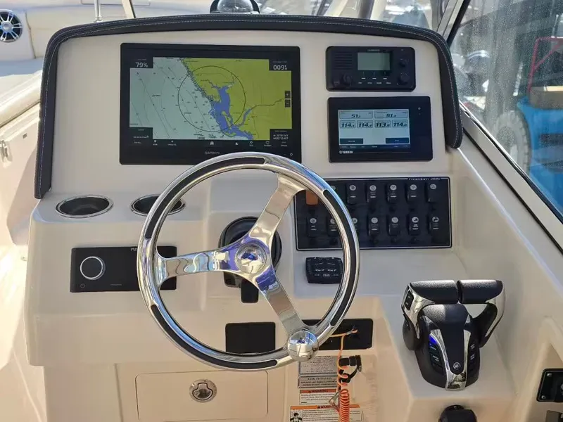 Slide: The Image of Grady-White Freedom 285 helm console, 2022 model. - 9