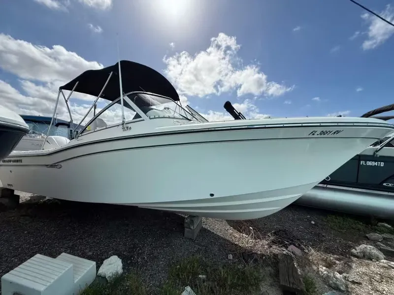 The Image of 2019 Grady-White Freedom 235 boat under blue sky. - 1