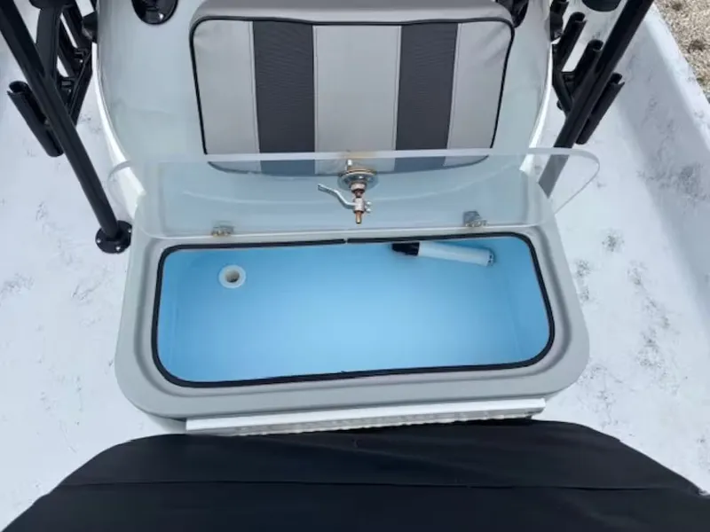 Slide: The Image of Open storage compartment in Shoalwater 20 CAT boat, year 2022. - 10