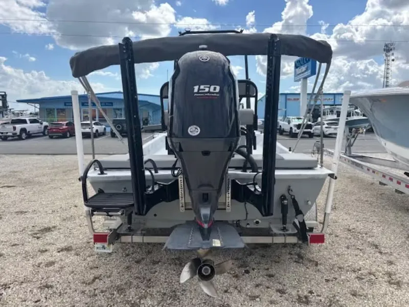 Slide: The Image of Rear view of a 2022 Shoalwater 20 CAT boat with outboard motor. - 4