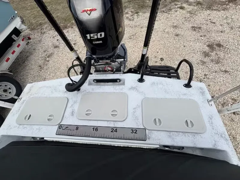 Slide: The Image of Rear view of a 2022 Shoalwater 20 CAT boat with Yamaha 150 engine. - 6