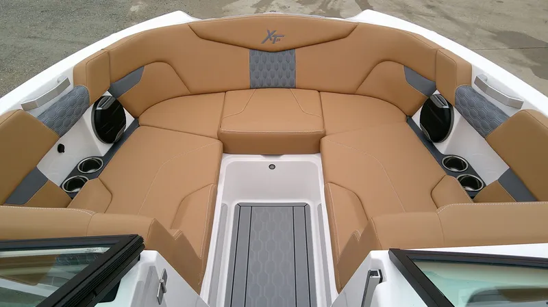 Slide: The Image of Interior of 2026 MasterCraft 24 XT with beige upholstery. - 16