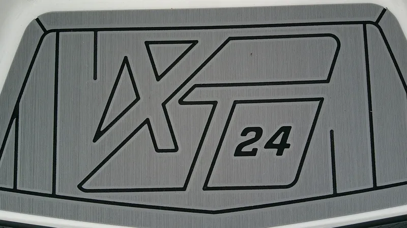 Slide: The Image of MasterCraft 24 XT 2026 logo on gray background. - 9