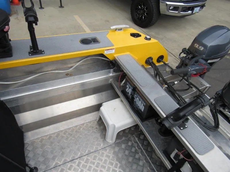 Slide: The Image of Interior view of a 2021 Stabicraft 1550 Fisher boat with motor. - 10