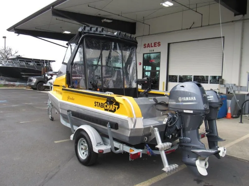 Slide: The Image of 2021 Stabicraft 1550 Fisher boat with Yamaha engines in sales area. - 3