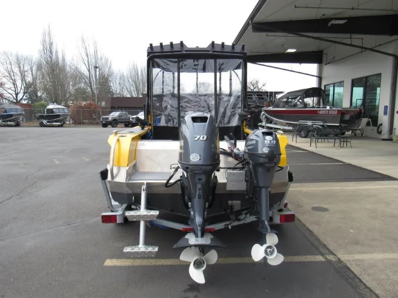 Slide: The Image of 2021 Stabicraft 1550 Fisher with dual outboard motors. - 4
