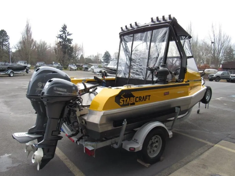 Slide: The Image of 2021 Stabicraft 1550 Fisher boat with Yamaha engines on trailer. - 5
