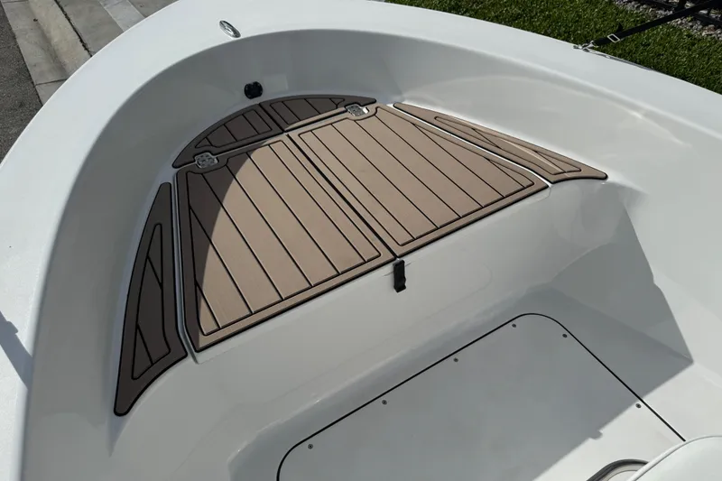 Slide: The Image of 2016 Sportsman Island Reef 17 Center Console interior with steering wheel and seating. - 25