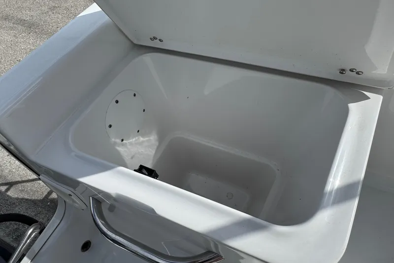 Slide: The Image of 2016 Sportsman Island Reef 17 Center Console boat detail with rod holders. - 33
