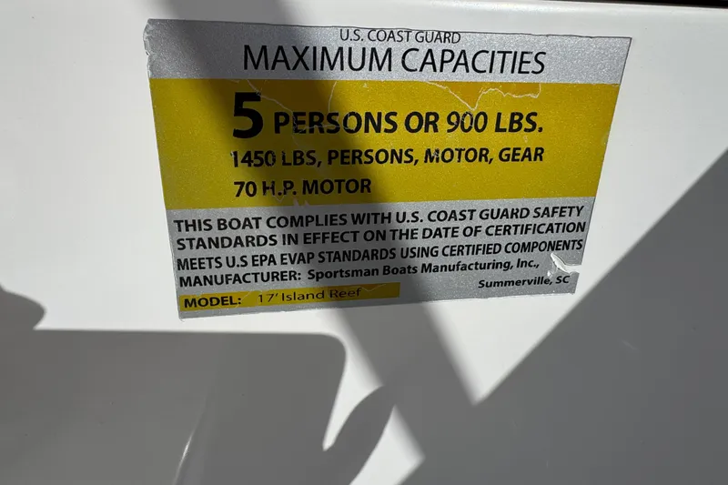 Slide: The Image of 2016 Sportsman Island Reef 17 Center Console with rod holders and seating. - 34