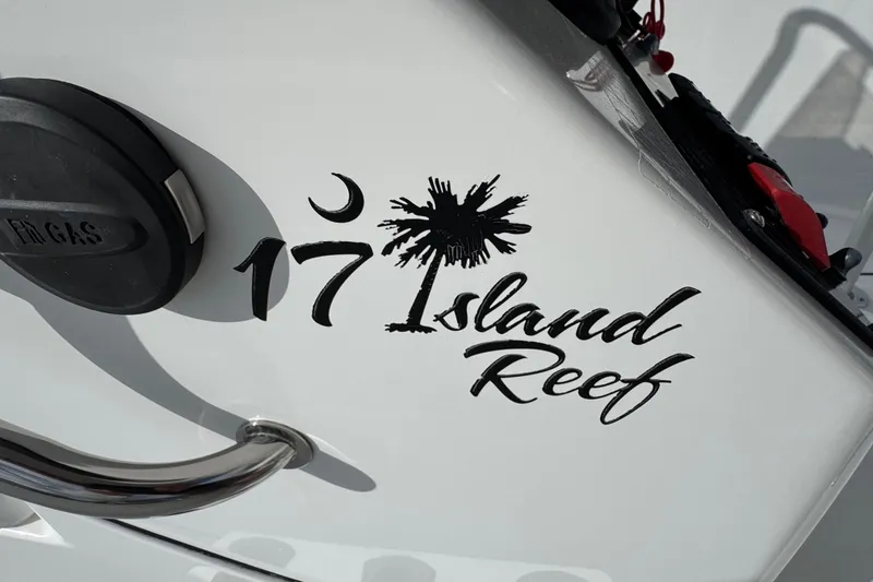 Slide: The Image of Garmin device on 2016 Sportsman Island Reef 17 Center Console boat dashboard. - 36