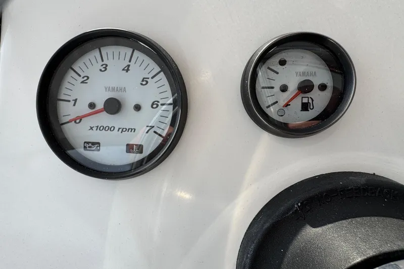 Slide: The Image of 2016 Sportsman Island Reef 17 Center Console boat interior with seating and console view. - 42