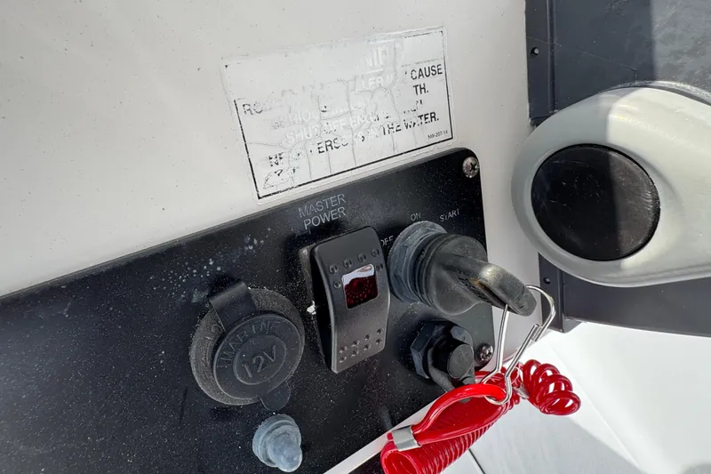 Slide: The Image of Open storage compartment on 2016 Sportsman Island Reef 17 Center Console boat. - 44