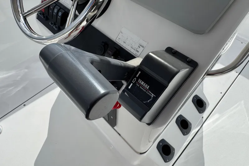 Slide: The Image of 2016 Sportsman Island Reef 17 Center Console interior compartment view. - 45