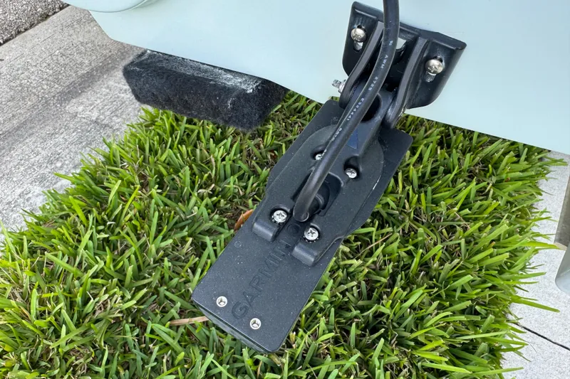 Slide: The Image of Transducer mounted on 2016 Sportsman Island Reef 17 Center Console, resting on grass. - 5