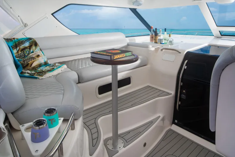 Slide: The Image of Luxurious interior of 2007 Tiara Yachts 4300 Sovran with ocean view and elegant seating. - 12