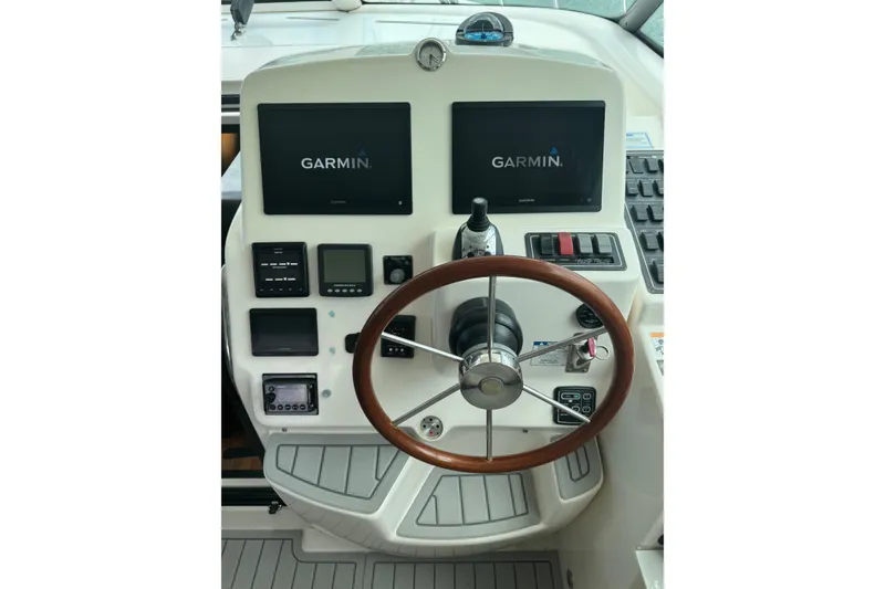 Slide: The Image of Helm of 2007 Tiara Yachts 4300 Sovran with Garmin navigation displays. - 17