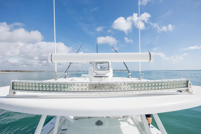 Slide: The Image of 2014 Yellowfin 42 Offshore boat with LED light bar on open sea. - 36