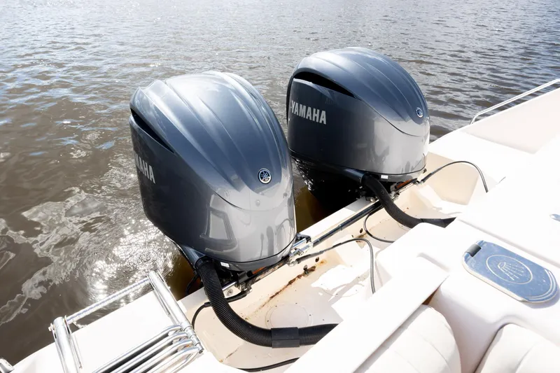Slide: The Image of Twin Yamaha outboard engines on a 2013 Grady-White Canyon 306 boat. - 17