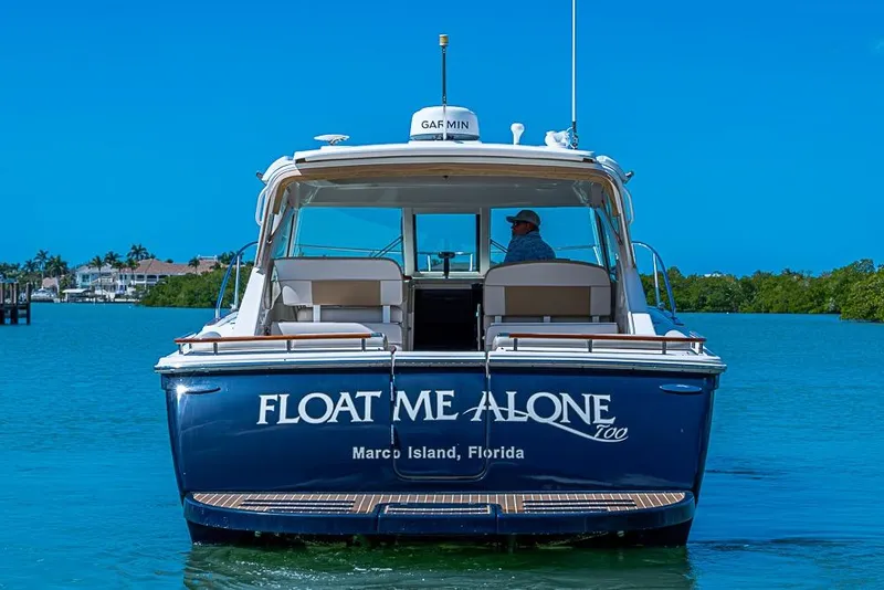 Slide: The Image of 2012 Tiara Yachts 3100 Coronet boat on water, "Float Me Alone" in Marco Island, Florida. - 3