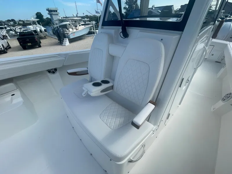 Slide: The Image of Luxurious seating in the 2024 Regulator 34 boat. - 19