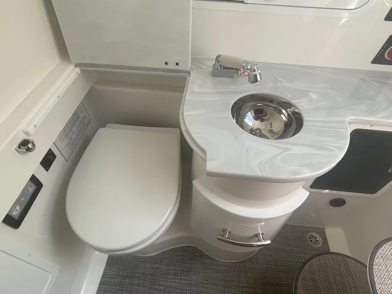 Slide: The Image of Luxurious bathroom in 2024 Regulator 34 boat. - 25