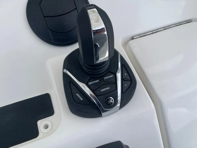 Slide: The Image of Joystick control on a 2024 Regulator 34 boat. - 30