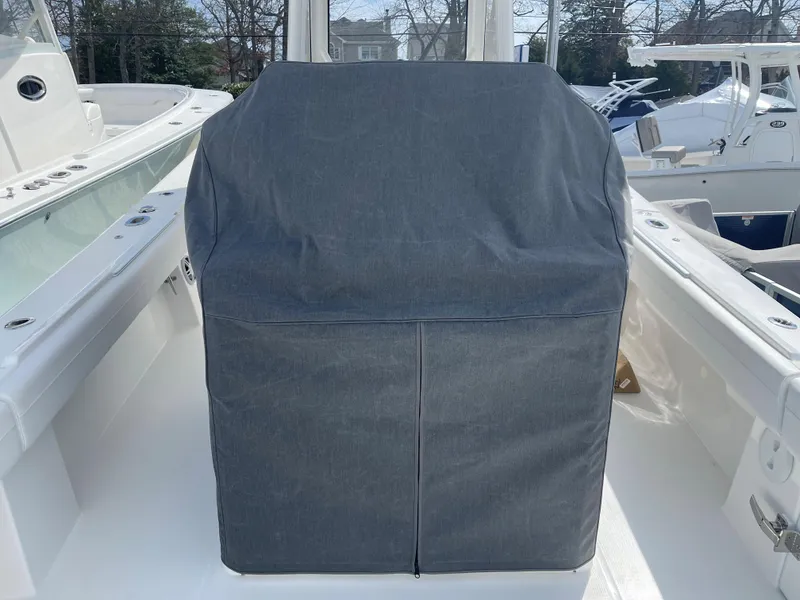 Slide: The Image of Covered helm station on a 2024 Regulator 34 boat. - 46