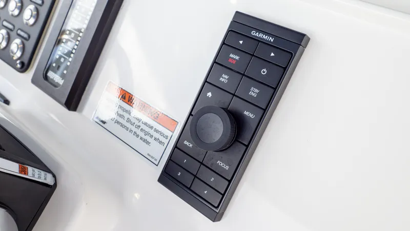 Slide: The Image of Control panel on 2022 Intrepid 345 Valor boat featuring Garmin navigation system. - 19
