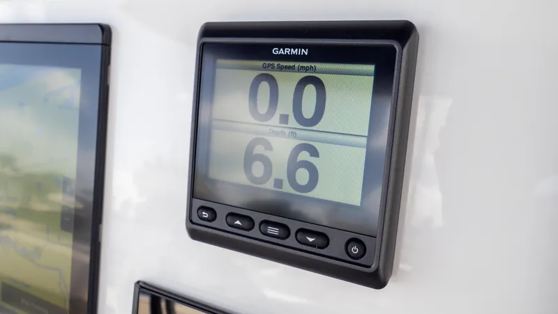 Slide: The Image of Garmin GPS display on 2022 Intrepid 345 Valor boat showing speed and depth. - 23