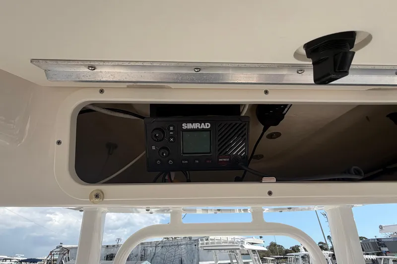 Slide: The Image of 2022 Robalo R242 Center Console with Simrad marine electronics installed. - 6
