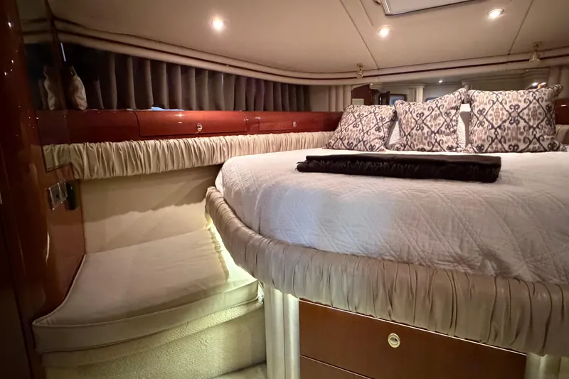 Slide: The Image of Luxurious bedroom interior of 2003 Sea Ray 560 Sedan Bridge yacht. - 8