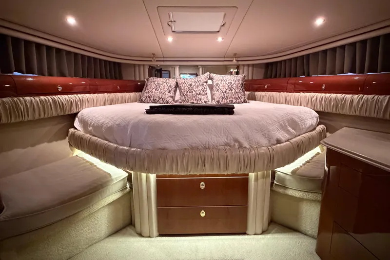 Slide: The Image of Luxurious bedroom interior of 2003 Sea Ray 560 Sedan Bridge yacht. - 9