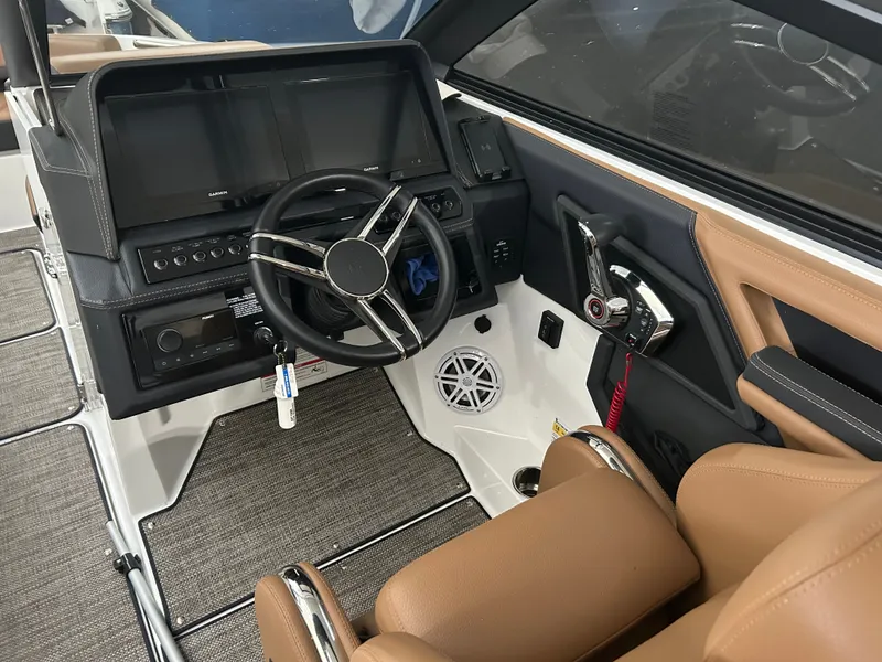 Slide: The Image of Interior of 2024 Cobalt R6 boat with modern helm console. - 13