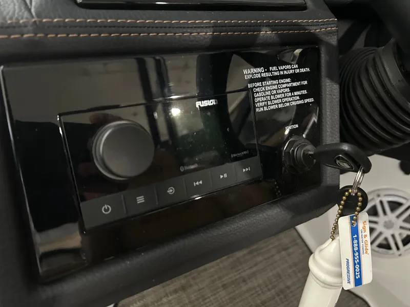 Slide: The Image of 2024 Cobalt R6 dashboard with ignition key and controls. - 17