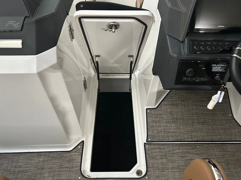 Slide: The Image of Interior of 2024 Cobalt R6 with open floor hatch. - 19