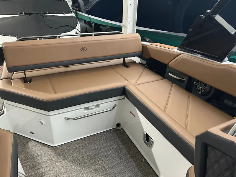 Slide: The Image of Interior of 2024 Cobalt R6 with beige leather seating. - 20