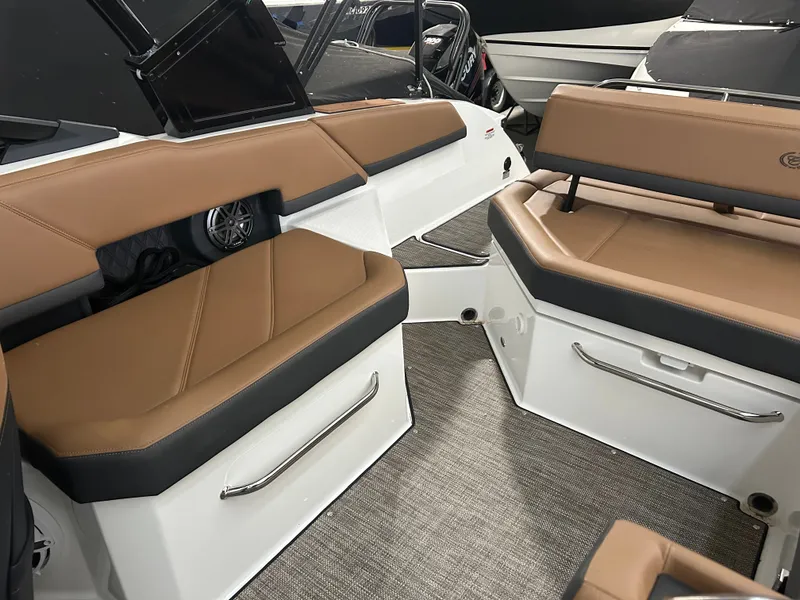 Slide: The Image of Interior of 2024 Cobalt R6 with brown leather seating. - 21