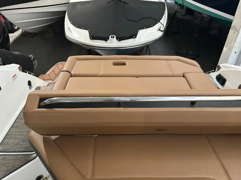 Slide: The Image of 2024 Cobalt R6 boat with brown leather seating. - 30