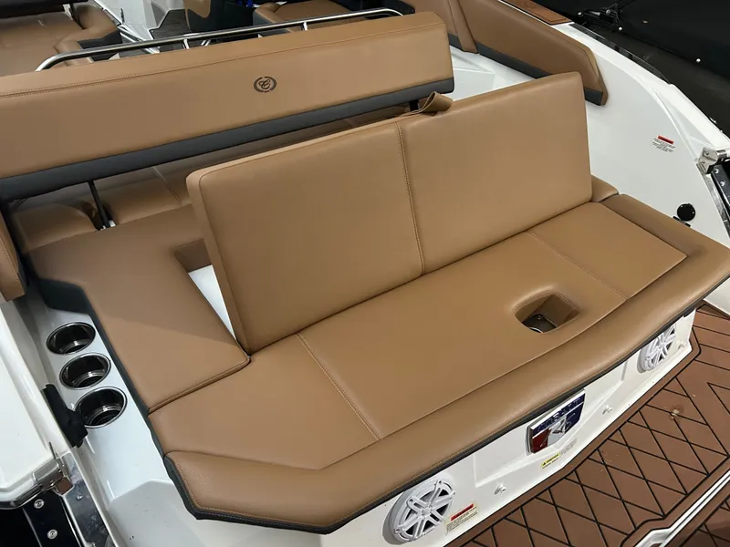 Slide: The Image of 2024 Cobalt R6 boat with brown leather seating. - 32