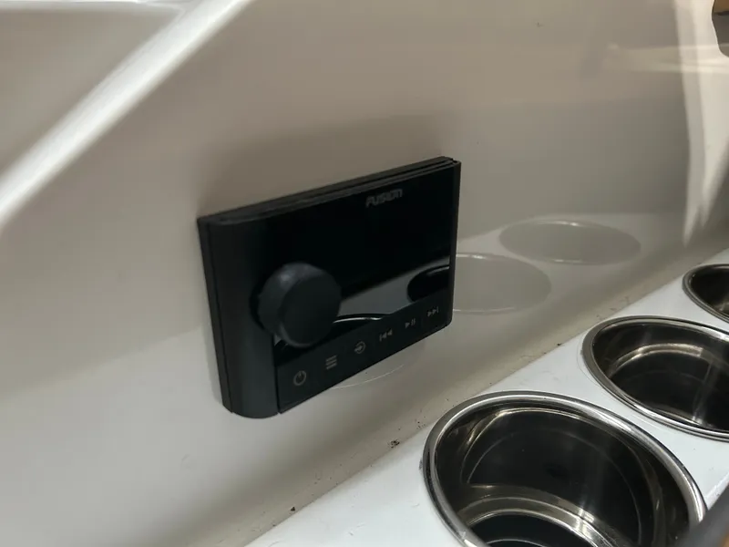 Slide: The Image of 2024 Cobalt R6 boat control with stainless steel holders. - 36