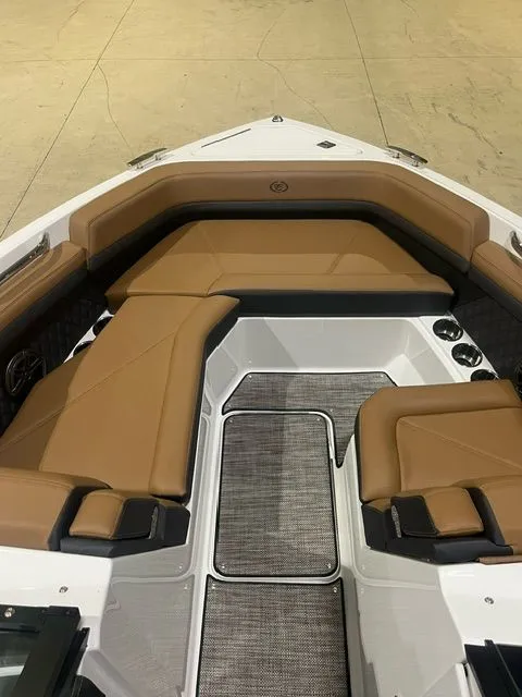 Slide: The Image of Interior of 2024 Cobalt R6 boat with brown leather seating. - 40