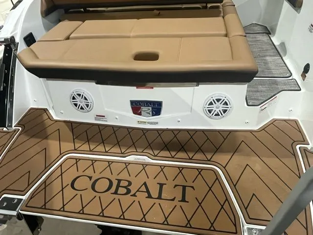 Slide: The Image of 2024 Cobalt R6 boat with brown deck and speakers. - 41