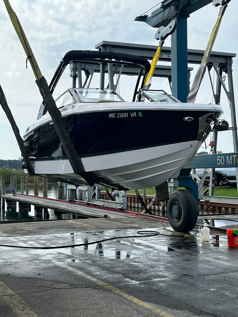 Slide: The Image of 2024 Cobalt R6 boat on harbor crane, ready for launch. - 46