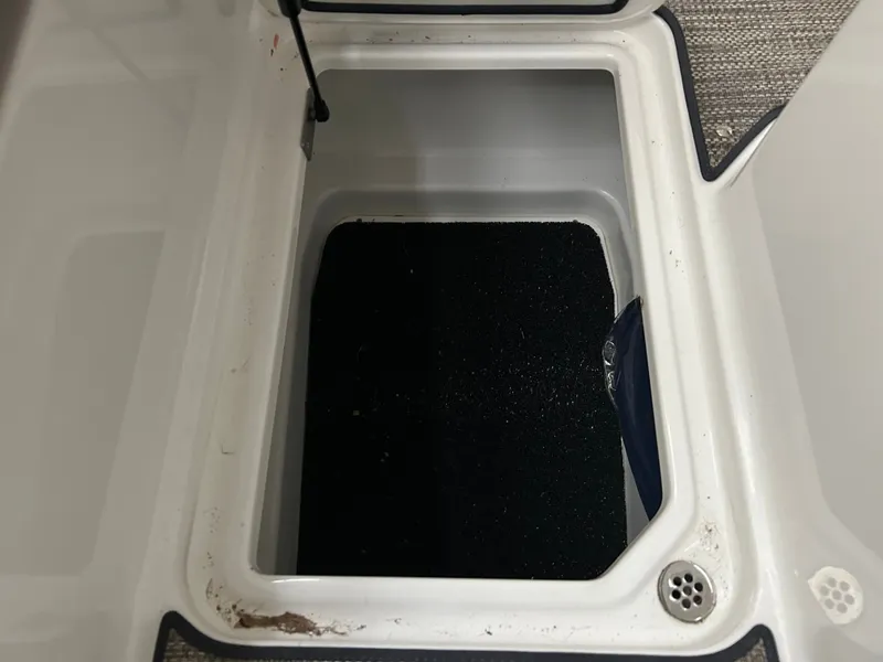 Slide: The Image of Storage compartment in 2024 Cobalt R6 boat, open lid. - 7