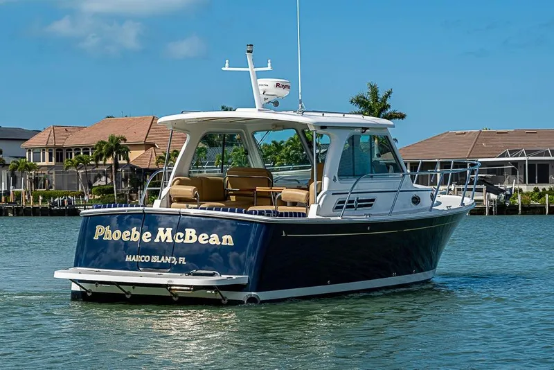 Slide: The Image of 2011 Back Cove 30 boat on water near Marco Island, Florida. - 2