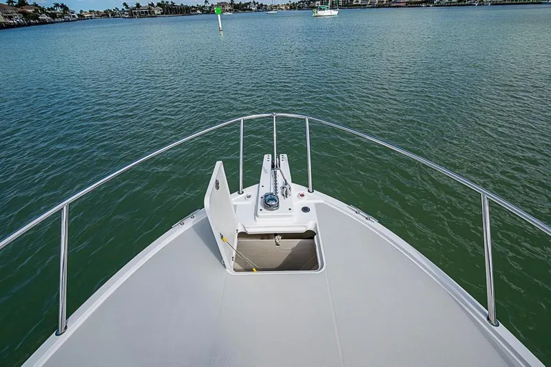 Slide: The Image of Bow view of 2011 Back Cove 30 boat on calm water. - 25