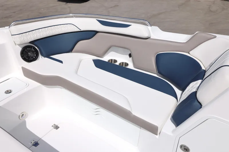 Slide: The Image of 2026 Hurricane SunDeck 2400 OB boat interior with blue and white seating. - 11