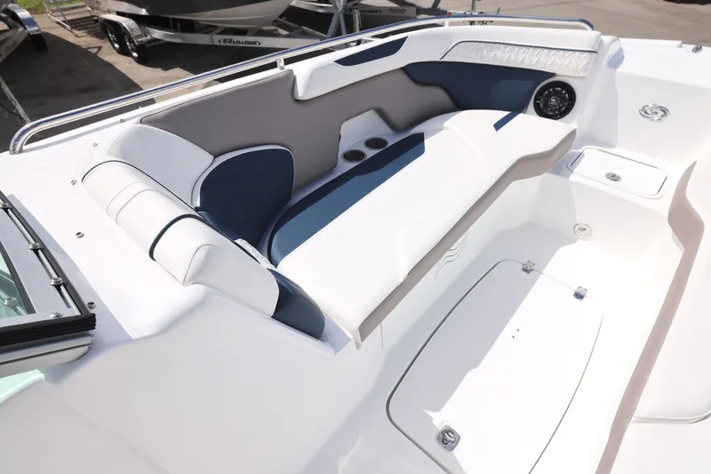 Slide: The Image of 2026 Hurricane SunDeck 2400 OB boat interior with sleek seating and modern design. - 14