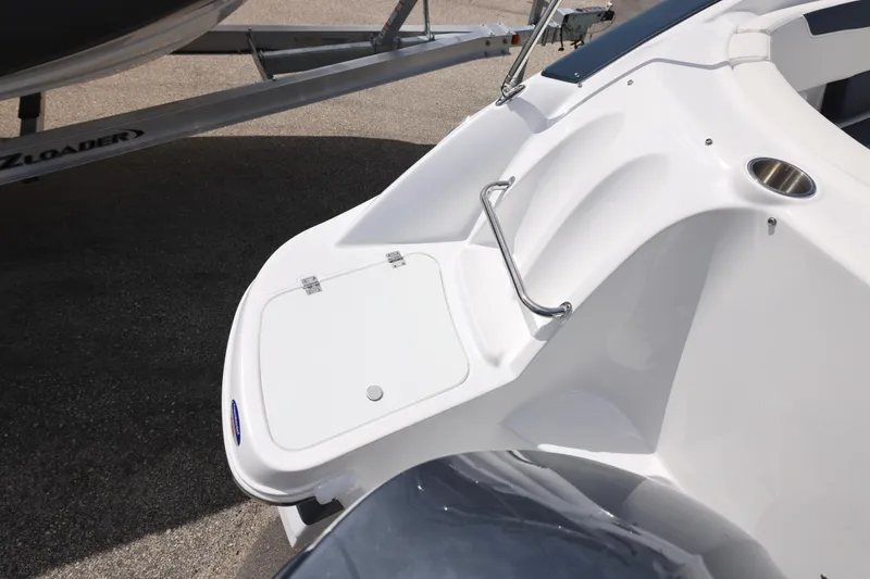 Slide: The Image of 2026 Hurricane SunDeck 2400 OB boat, rear deck view with stainless steel handle. - 17